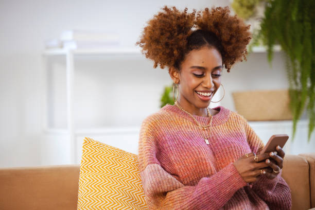 istock Pleased gen Z young woman using phone 2154860447