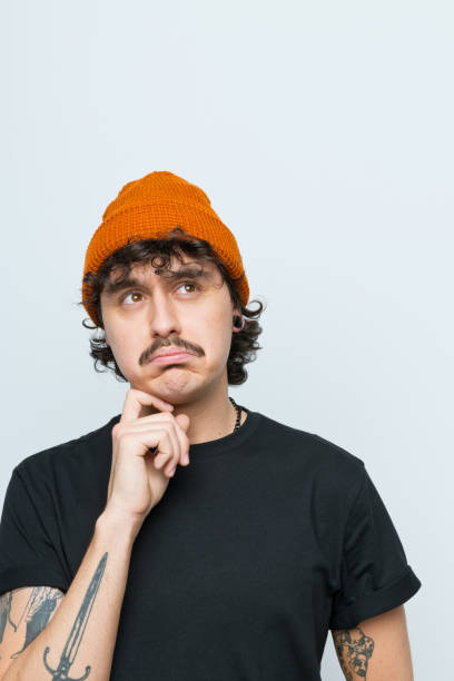 istock Portrait of confused young man 2154861226