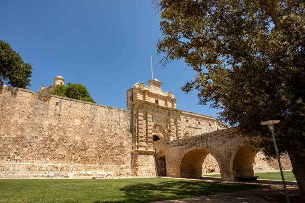 istock Entrance bridge and gate to Mdina, Malta. 2154861987