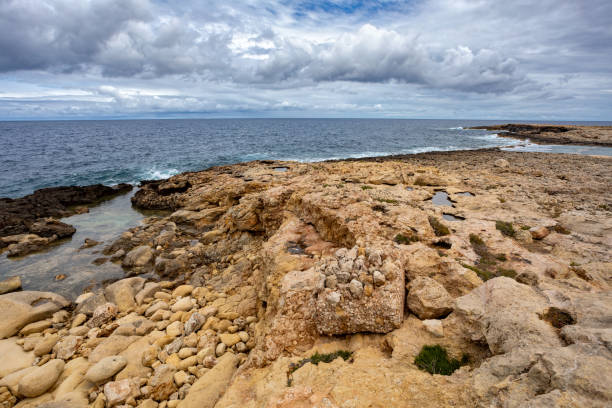 istock Qawra Point Beach with turquoise waters nearby. Malta 2154862005