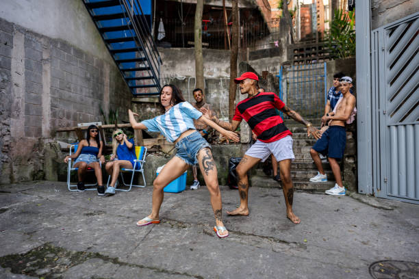 Friends dancing break outdoors