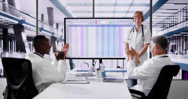 istock Doctor Showing Medical Codes Training Presentation 2154863707