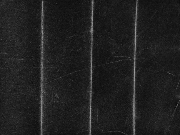 istock Black paper background. Old wallpaper. Grunge texture 2154866382