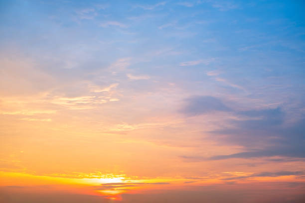 istock Beautiful , luxury soft gradient orange gold clouds and sunlight on the blue sky perfect for the background, take in everning,Twilight, Large size, high definition landscape photo 2154874766