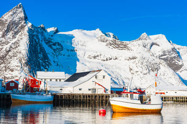 istock Boats in Harbor With Winter Mountain Background 2154875972