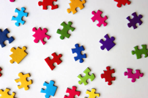 istock Colorful Jigsaw Puzzle Pieces 2154877928