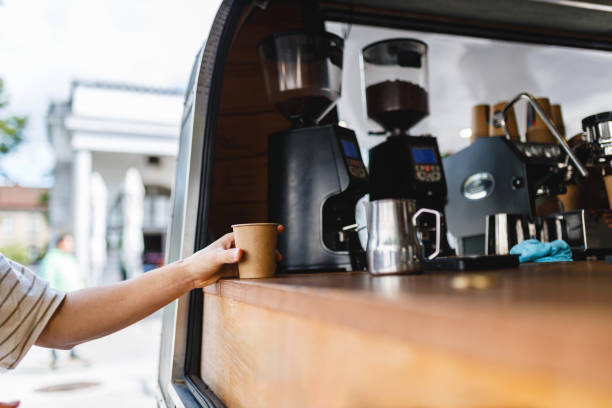 istock Customer Receiving Coffee From Mobile Coffee Shop 2154878134