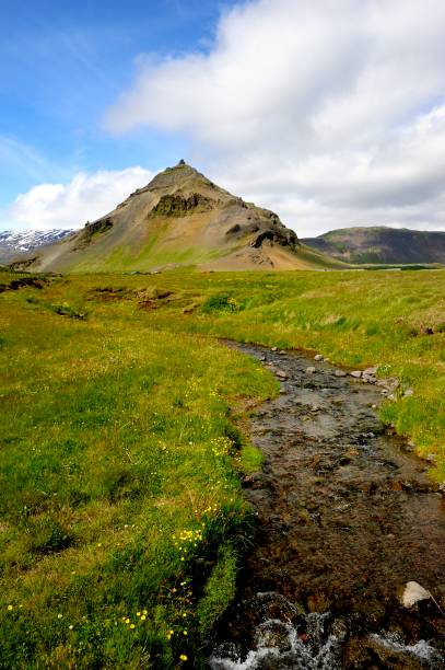 istock Farm buildings below the  mountain 2154882325