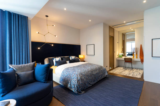 istock Modern blue color tone bedroom with hanging lamp. 2154883762