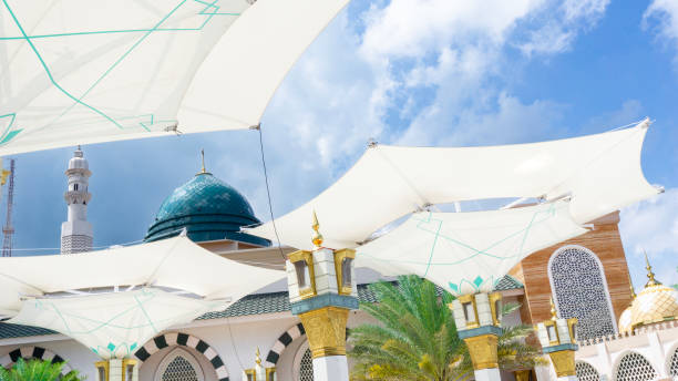 istock Big umbrella in mosque with a blue sky background 2154884388