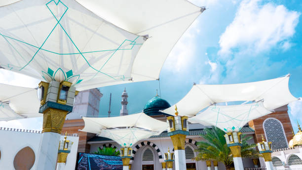 istock Big umbrella in mosque with a blue sky background 2154884494
