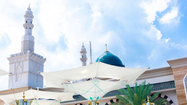 istock Big umbrella in mosque with a blue sky background 2154884495