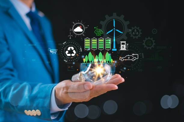 istock Green energy sustainable development goal (SDG) concept. Hand hold light bulb, global communication network with environmental icon. Carbon credit technology management. Environment friendly business 2154885435