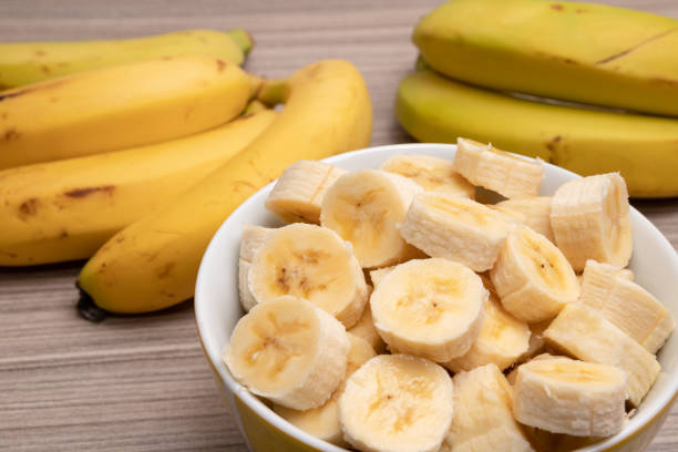 istock sliced ​​banana inside a white bowl jar 2154887151