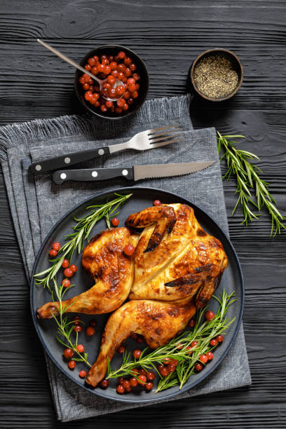 istock butterflied, spatchcock roast chicken on a plate 2154891729