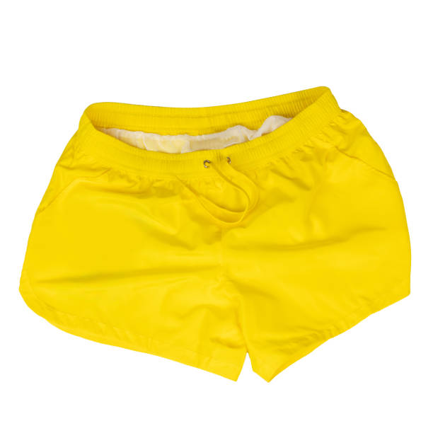 istock Yellow Swim Shorts Flat Lay. Copy Space 2154892246