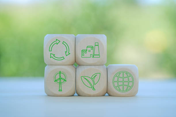 istock environment Earth concept. Net zero greenhouse gas emissions target. Climate neutral long term strategy. wooden cubes with decarbonization icon and green icon. Green banner. 2154893946