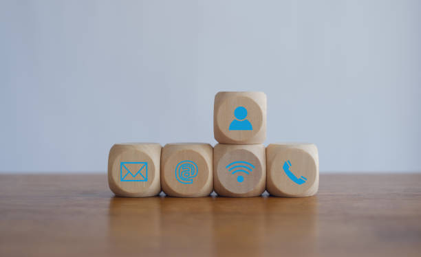 istock Customer support hotline Contact us people connection.Website page contact us or e-mail marketing concept,  Chat message icons. address,call phone, address, Label wood with the email. 2154893986