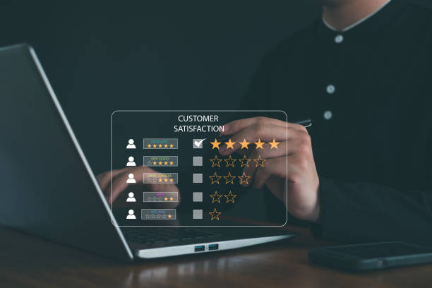 istock Customer service experience and business satisfaction survey, close up  hand using smart phone and give five star symbol to increase rating of product and service concept. 2154894013