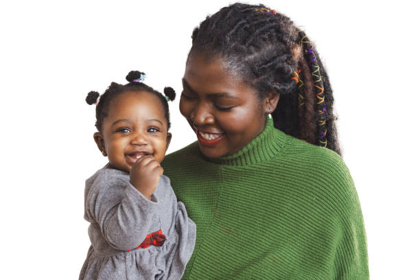 Loving mother holding her one year old daughter