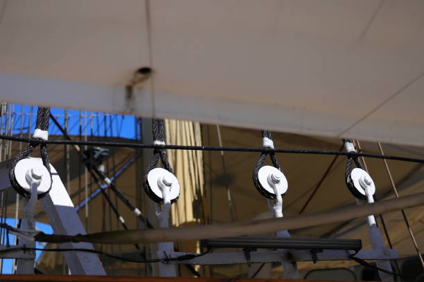 Four white circles and black ropes on the ship