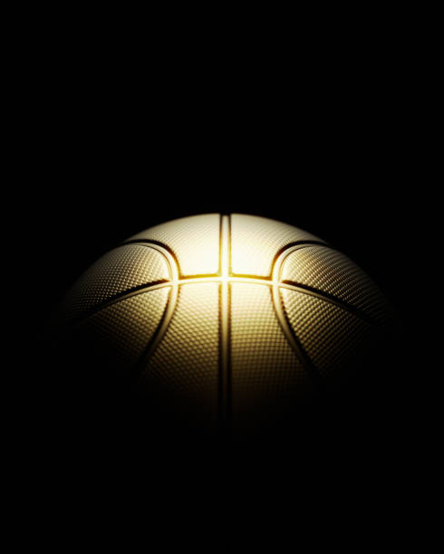 istock Gold Colored Basketball Ball On Black 2154900136