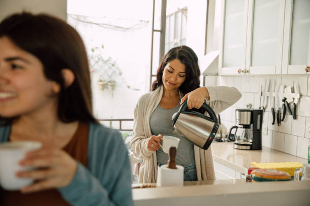 istock Tea o'clock. Friends enjoying a drink at home 2154901868