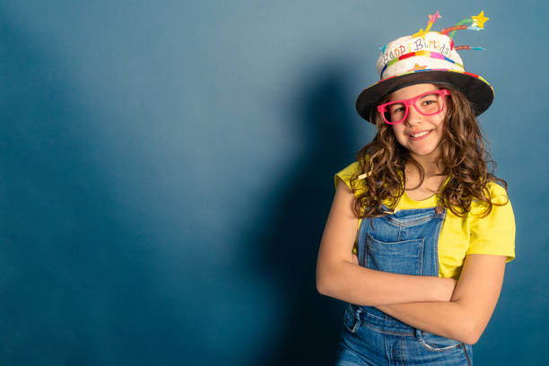istock children's entertainer with colorful hat 2154902073