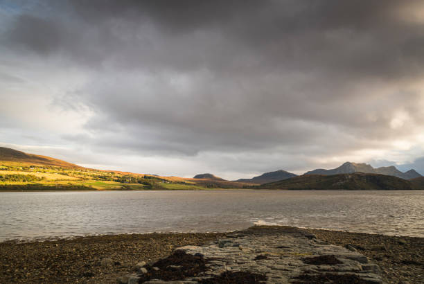 A bright, autumnal landscape HDR image of the Kyle of Tongue with Ben Loyal in the background, Sutherland, Scotland.