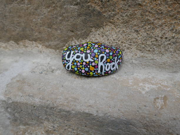 istock You rock kindness rock on concrete wall 2154904420