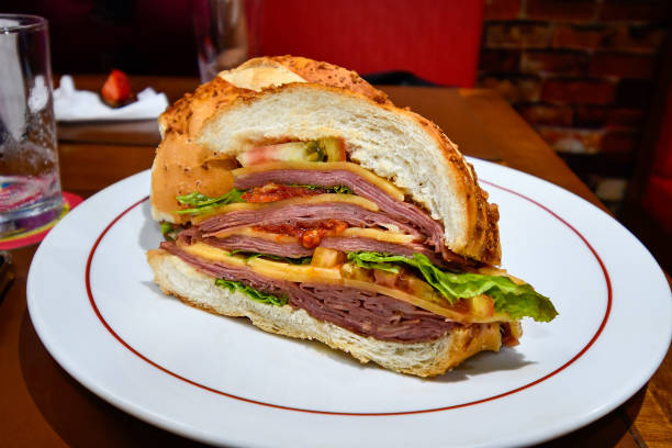 Italian sandwich with salami and lettuce