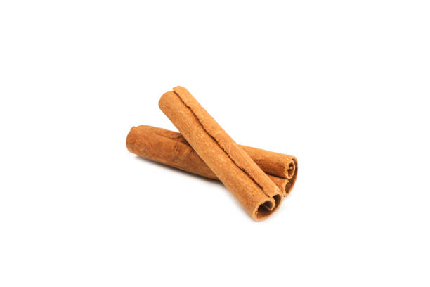 istock Cinnamon sticks isolated on white background. Cinnamon roll. Spicy spice for baking, desserts and drinks. Fragrant ground cinnamon. 2154907794
