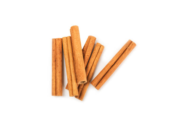 istock Cinnamon sticks isolated on white background. Cinnamon roll. Spicy spice for baking, desserts and drinks. Fragrant ground cinnamon. 2154907797