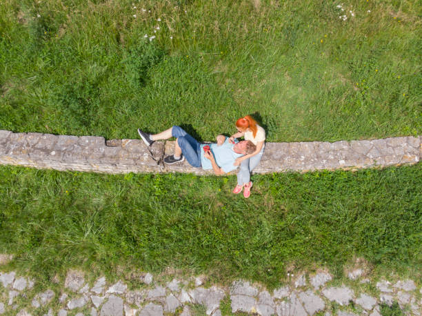 istock Couple eating strawberries outdoors 2154908009