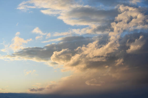 Beautiful red and blue clouds in the evening. A beautiful sunset with clouds.