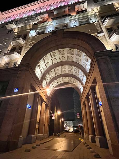 istock Illuminated residential building Arch at night 2154909280