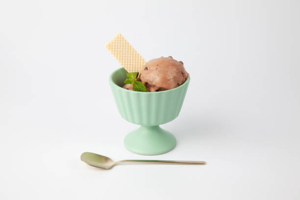chocolate ice cream with wafer on dessert cup isolated on white background