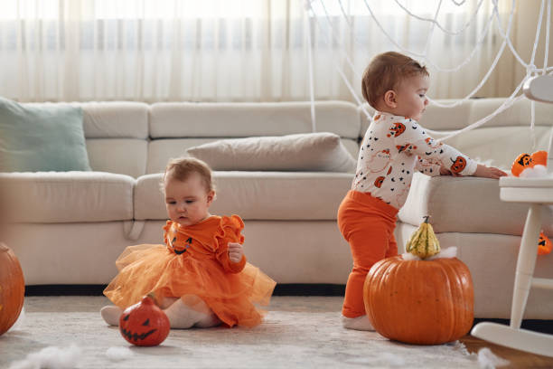 istock Twin sisters on Halloween day 2154914114