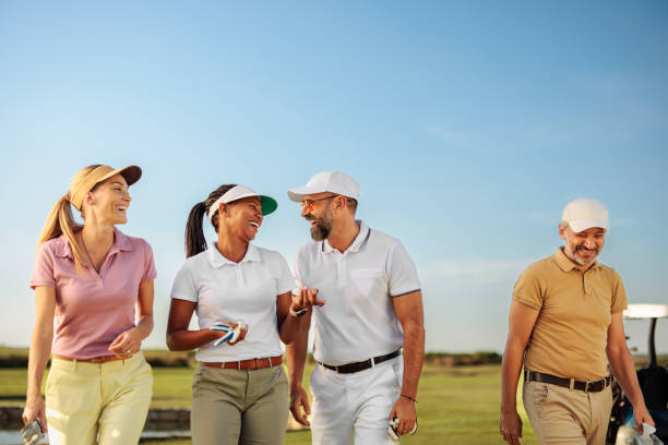 istock Friends laughing on a golf field 2154914554