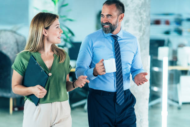 istock Business colleagues talking in the office 2154917257