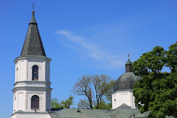 istock Two church towers and the blue sky 2154917867