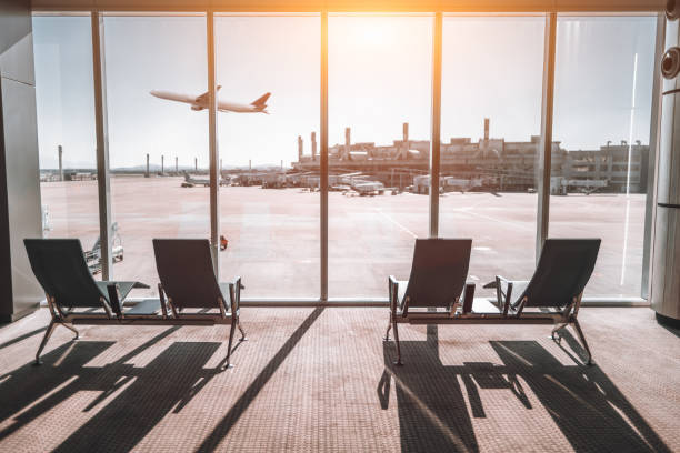 istock Airport with a plane taking off 2154918472