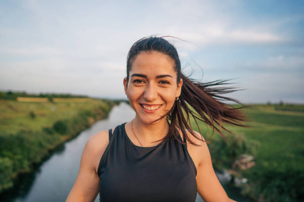 istock young woman exercising outside 2154919522