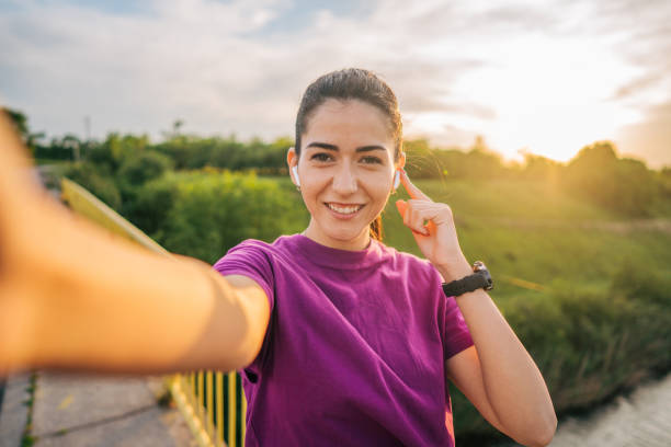 istock young woman exercising outside 2154919708