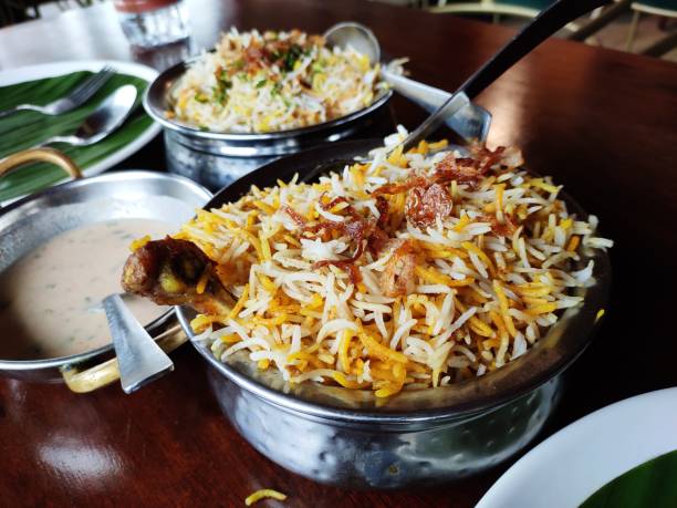 istock Indian cuisine - Kolkata biryani made with basmati rice, chicken, boiled egg and potato. 2154920032