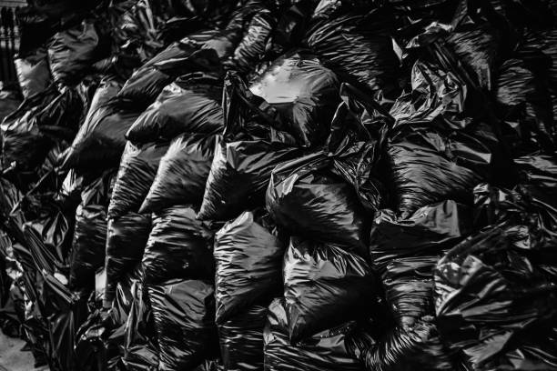 Black Bin Bags - a huge pile