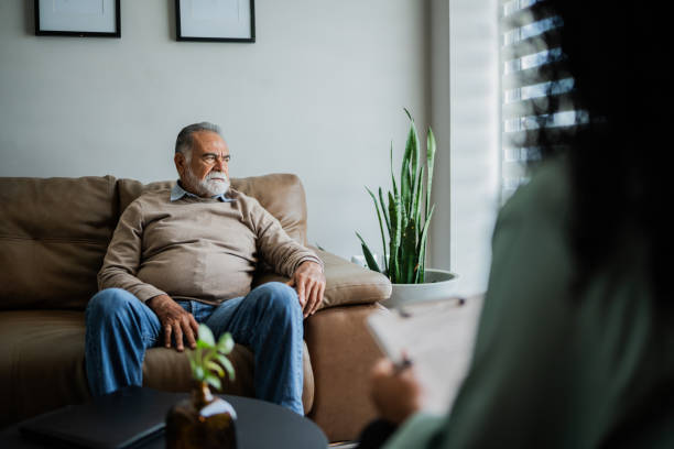 istock Senior man during therapy session at clinic 2154925947
