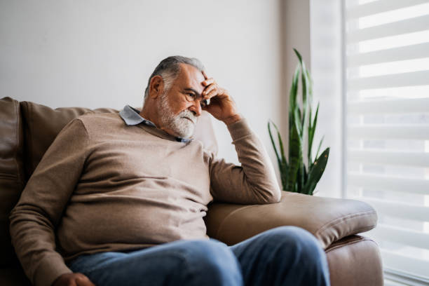 istock Worried senior man at home 2154926170