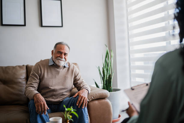 istock Senior man during therapy session at clinic 2154926199