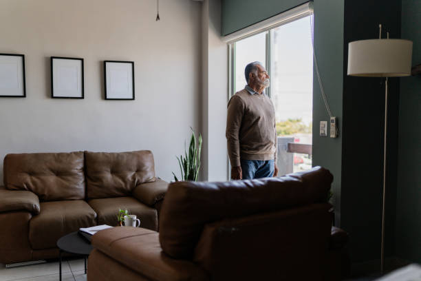 istock Senior man contemplating at home 2154926397